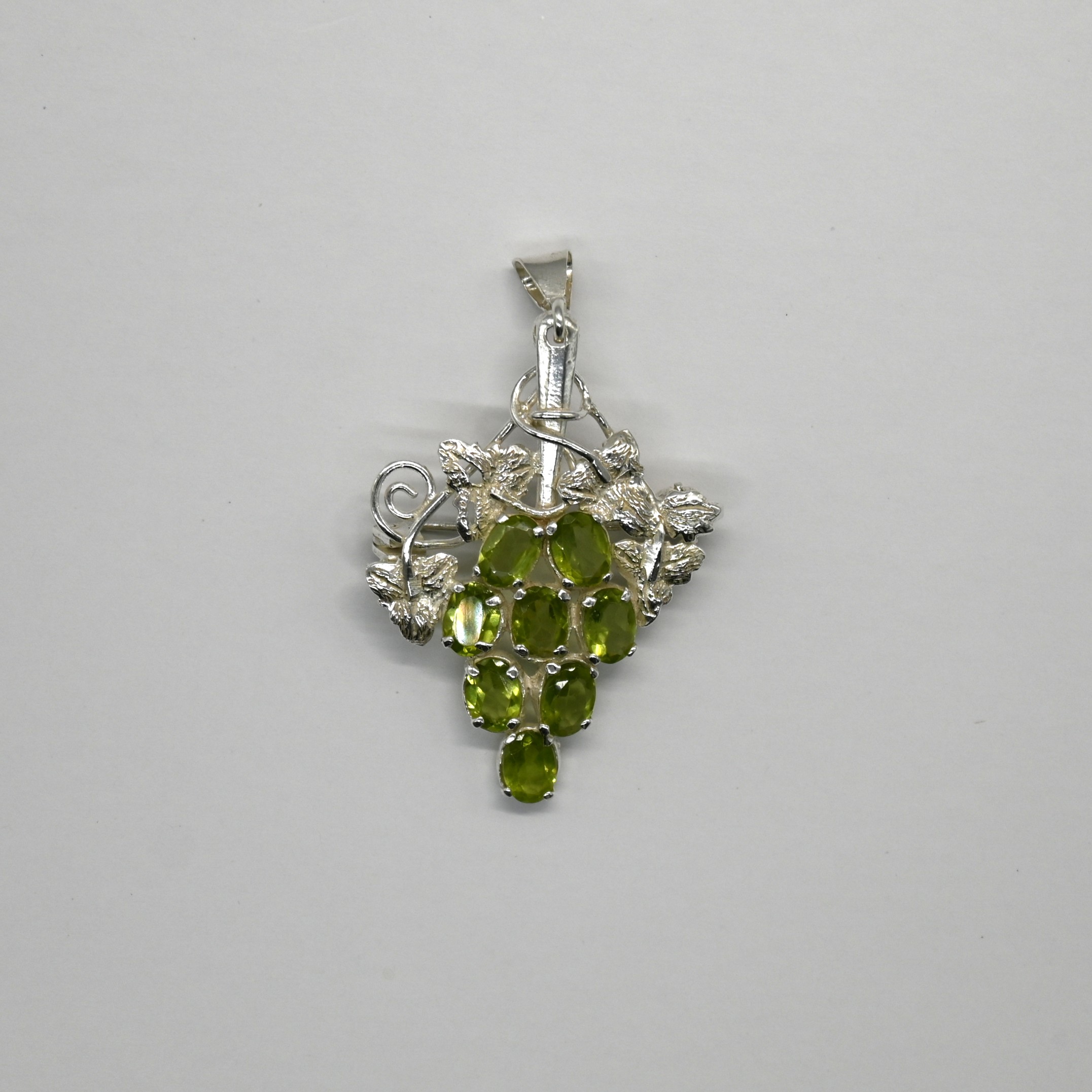 3.2cm W x 4.5cm H; Weight 7g; Authentic Peridot Stones; Naturalistic Design. Peridot Pendant, Grape Cluster Design, Sri Lanka Silver, Green Gemstone
