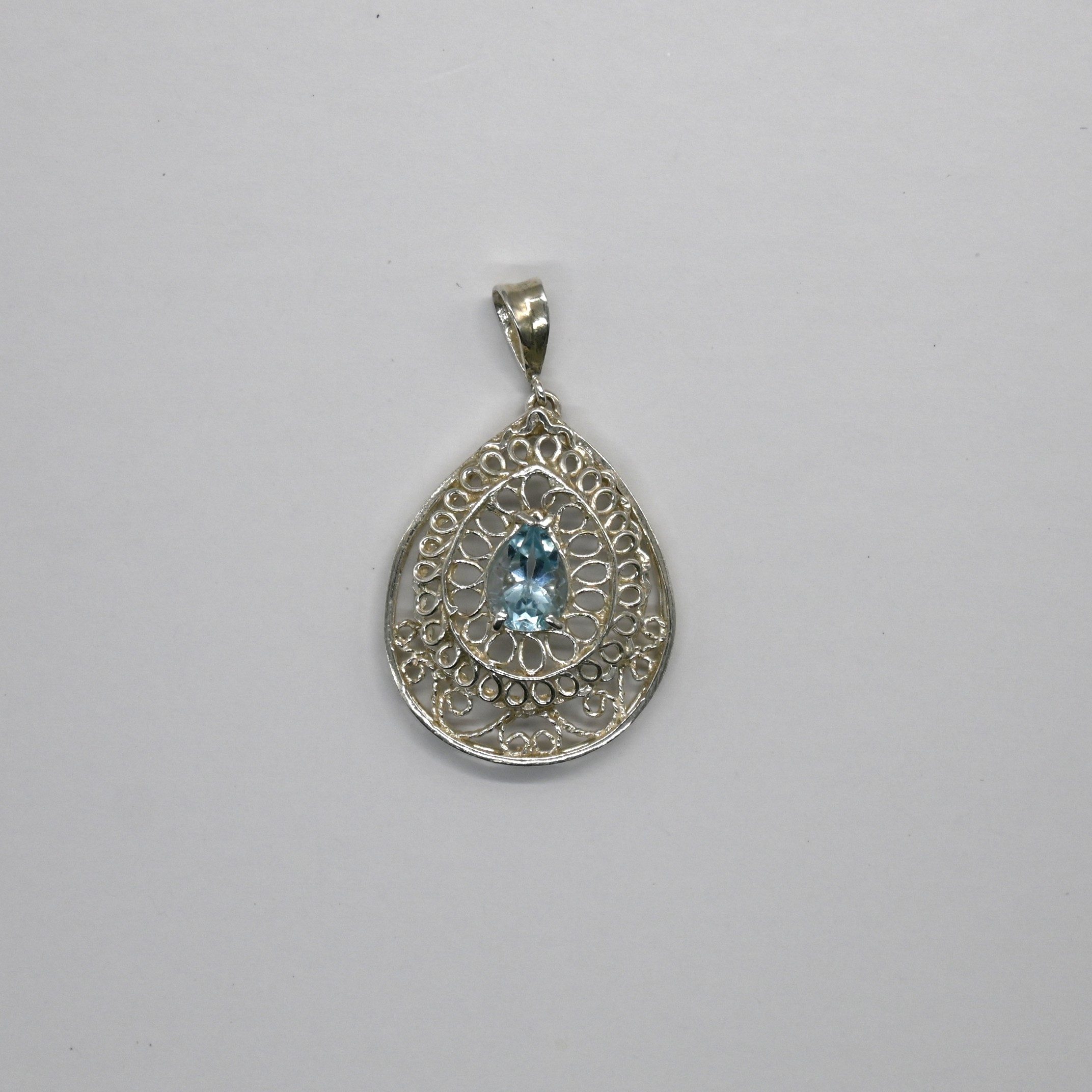 2.5cm W x 3.2cm H; Weight 5.5g; 925 Silver; Detailed Hand-pierced Work. Filigree Silver, Blue Topaz, Sri Lanka Jewelry, Handmade Pendant