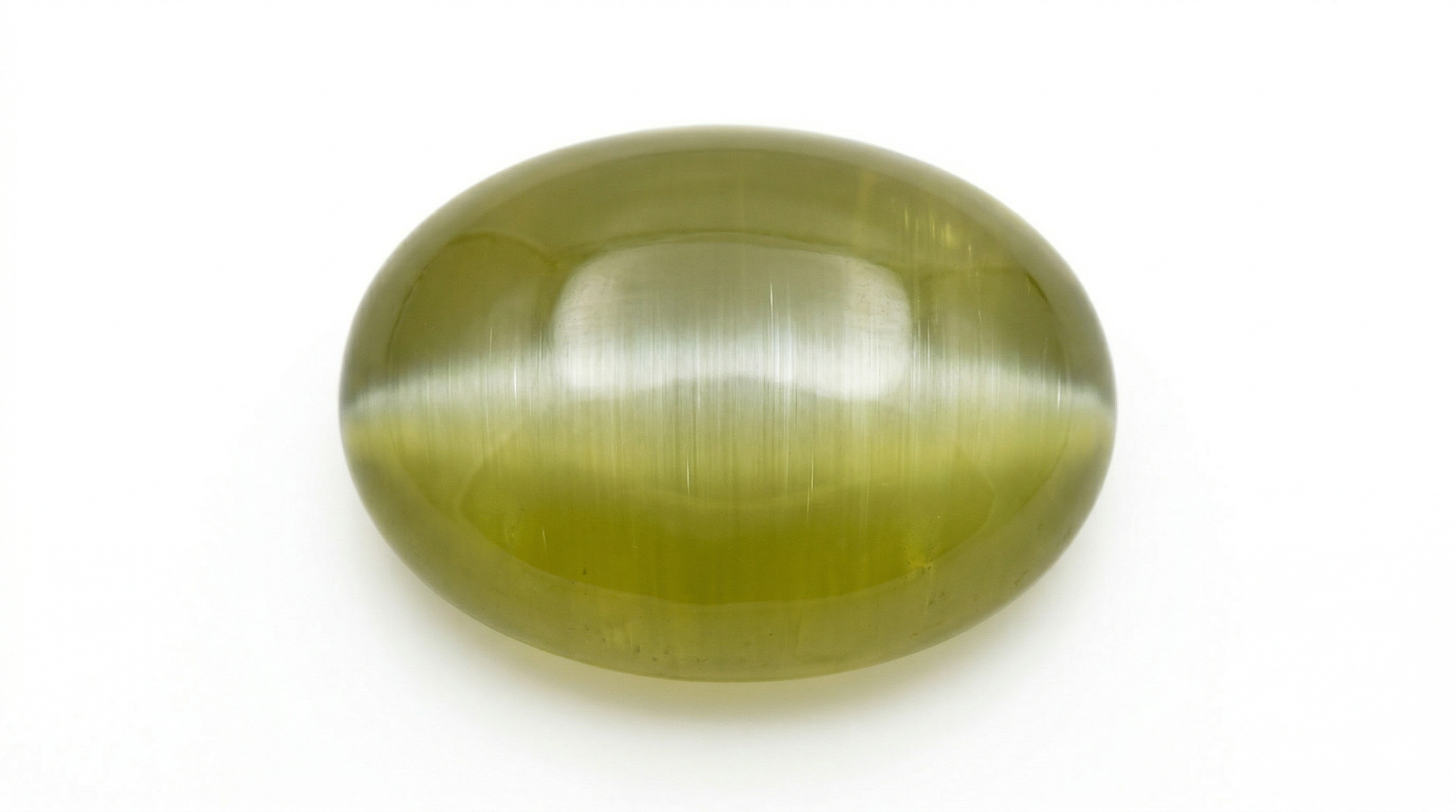 The finest Chrysoberyl Cat's Eye in the world. Features a sharp, milky-way effect and honey-colored body. Sourced from Ceylon. Cat's Eye (Cymophane)