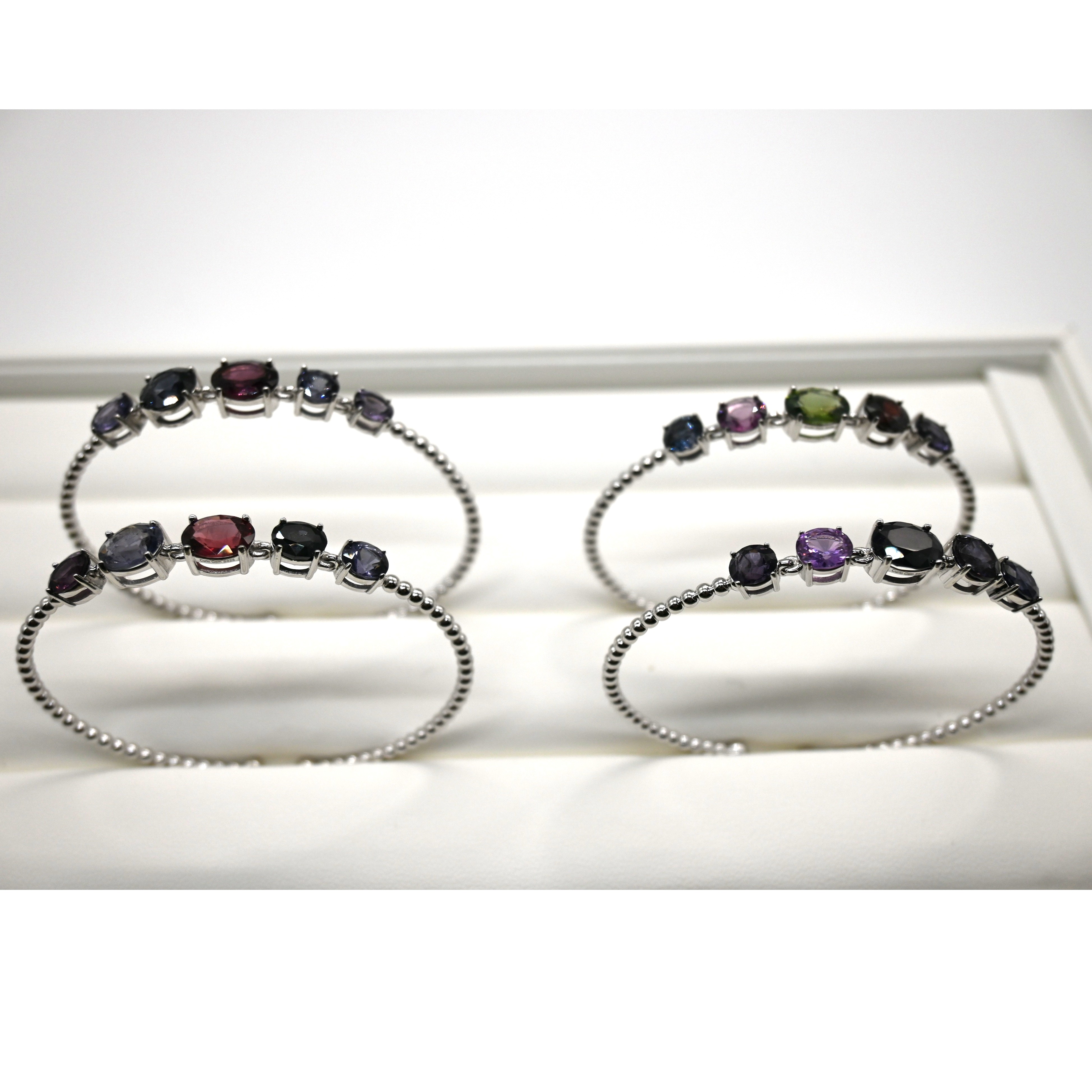 • Bold Design: Open cuff style with 5 large oval gemstones. • Dimensions: Inner diameter 57mm; 8.5g silver weight. • Gems: Approx 7ct of vibrant natural stones. • Versatility: Easy to put on/off; stacks well with other bangles. BRS020~23, Silver cuff bangle, multi-gem bangle, 57mm open bangle, luxury silver cuff, statement jewelry